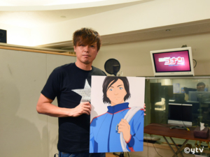 ご自分のキャラクターパネルを持ったガンバ大阪・遠藤保仁選手